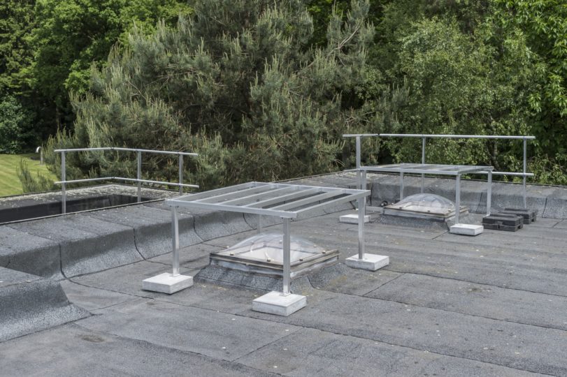 hekwerk op plat dak