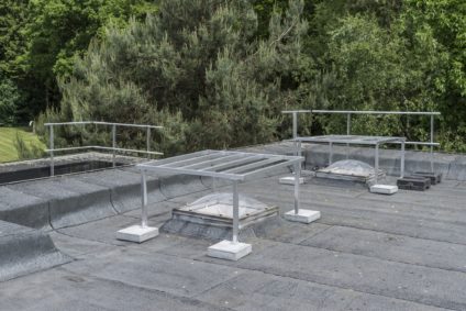 hekwerk op plat dak